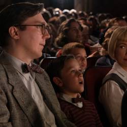 (from left) Burt Fabelman (Paul Dano), younger Sammy Fabelman (Mateo Zoryan Francis-DeFord) and Mitzi Fabelman (Michelle Williams) in The Fabelmans, co-written and directed by Steven Spielberg.